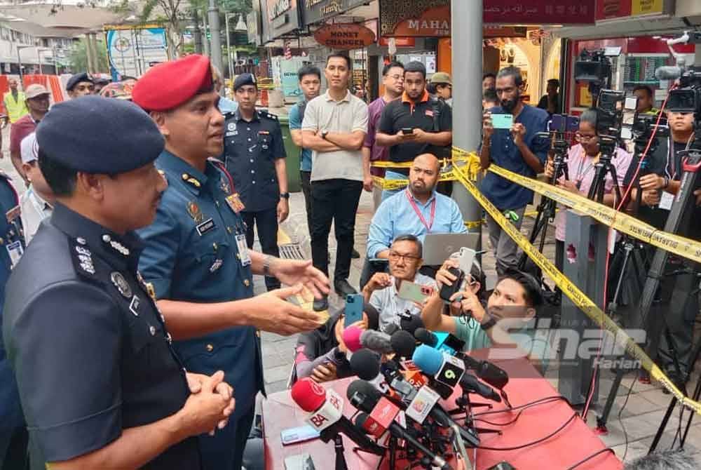 Nor Hisham ketika sidang akhbar di lokasi insiden tanah jerlus dekat Jalan Masjid India di sini pada Khamis.