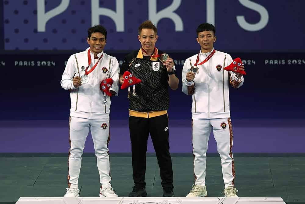 Liek Hou mempertahankan pingat emas perseorangan lelaki SU5 (kecacatan fizikal), sekali gus pingat emas pertama Malaysia di Sukan Paralimpik Paris 2024. Foto Bernama