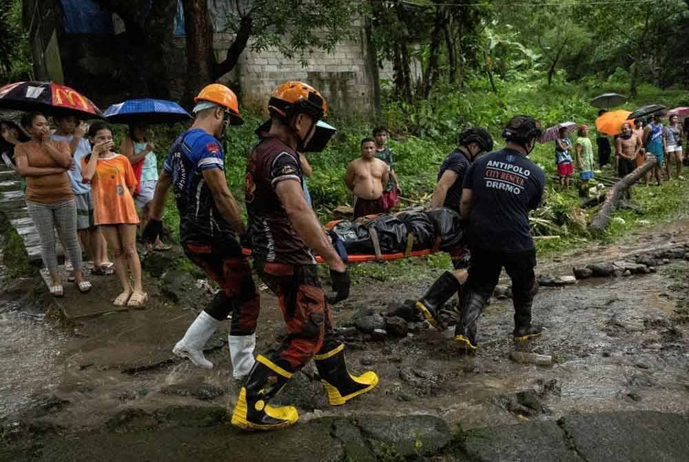 Sembilan daripada angka korban meninggal dunia dalam banjir kilat dan tanah runtuh di Wilayah Rizal, di timur Manila - Foto: Reuters