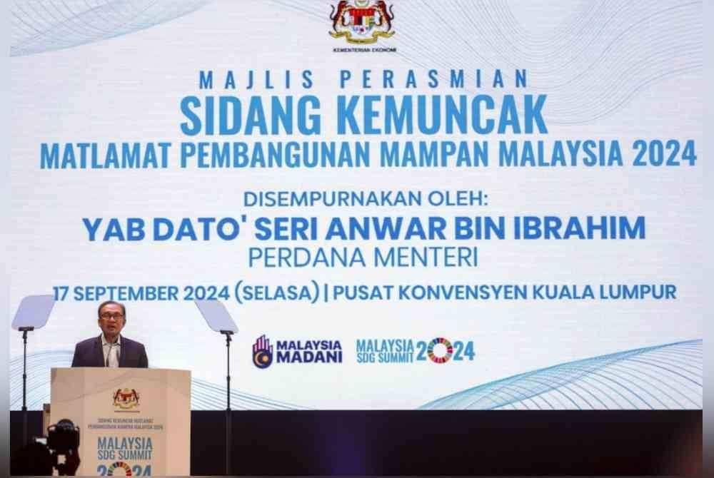 Anwar berucap ketika hadir bagi merasmikan Sidang Kemuncak Matlamat Pembangunan Mampan Malaysia (SDG) 2024 di Pusat Konvensyen Kuala Lumpur pada Selasa. Foto Bernama