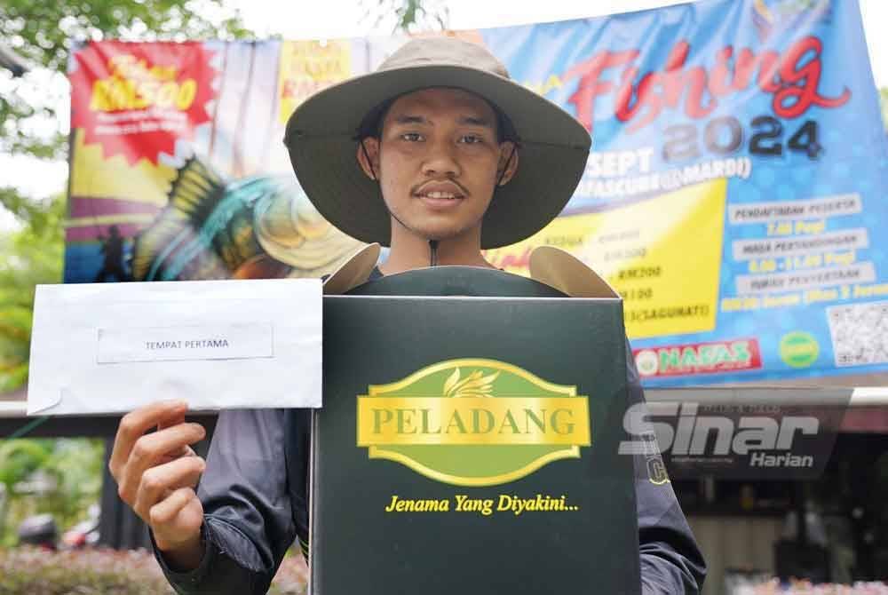 Mohd Helmi dinobatkan juara pertandingan memancing &#039;Fun Fishing&#039; sempena MAHA 2024. Foto Rosli Talib - SINAR HARIAN