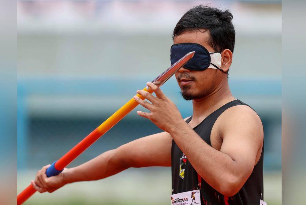 Ahmad Fikri memenangi pingat emas dalam acara Rejam Lembing Lelaki F11 di Para Sukma Sarawak dengan rejaman sejauh 29.92 meter. Foto Bernama