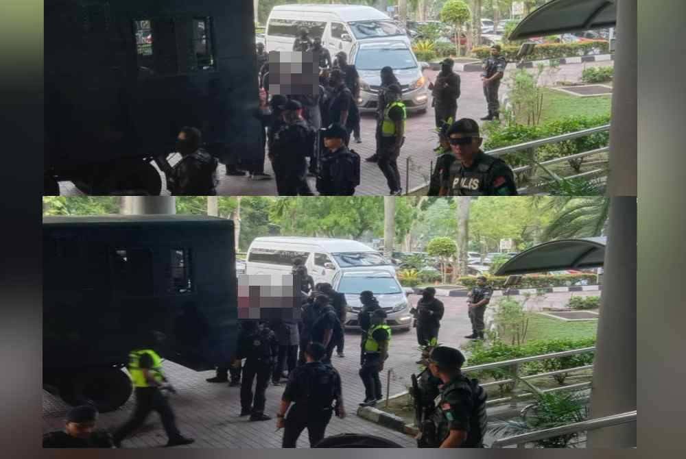 Anggota polis melakukan kawalan ketat sekitar Kompleks Mahkamah Shah Alam ketika 10 individu termasuk Pengerusi GISBH dibawa untuk proses sambung reman pada Rabu.