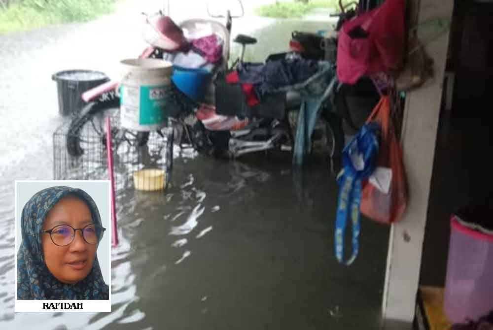 Keadaan luar rumah Rafidah di Kampung Bukit Lanchong pada Rabu. 