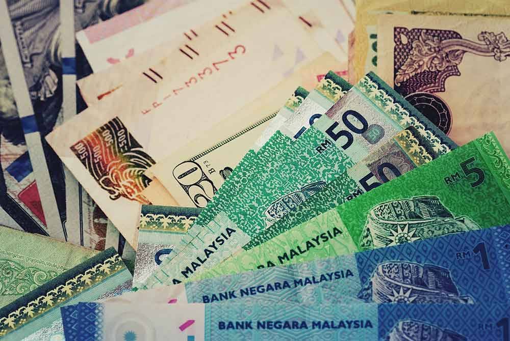 Ringgit dijangka terus meningkat minggu depan, meskipun peniaga kekal berhati-hati terhadap petunjuk ekonomi utama AS. Foto hiasan 123RF