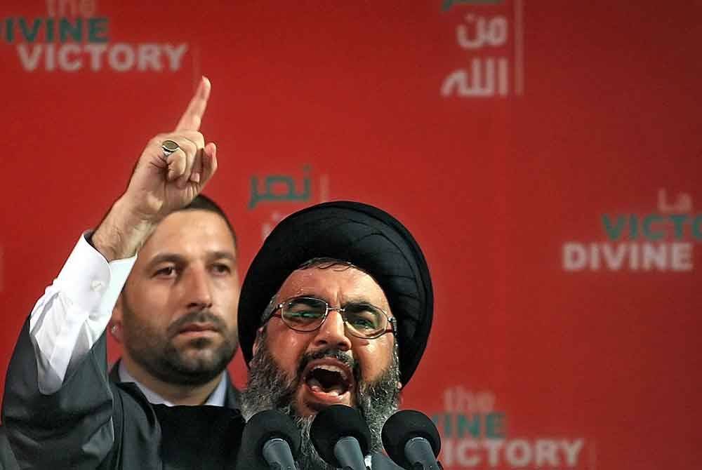 Ketua Hizbullah,Hassan Nasrallah ketika menyampaikak ucapan di Beirut pada 2006. - AFP