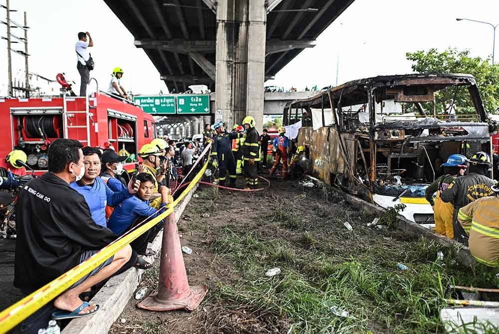 Sekurang-kurangnya 23 orang terkorban selepas bas dua tingkat yang dinaiki mereka terbakar pada Selasa. Foto AFP