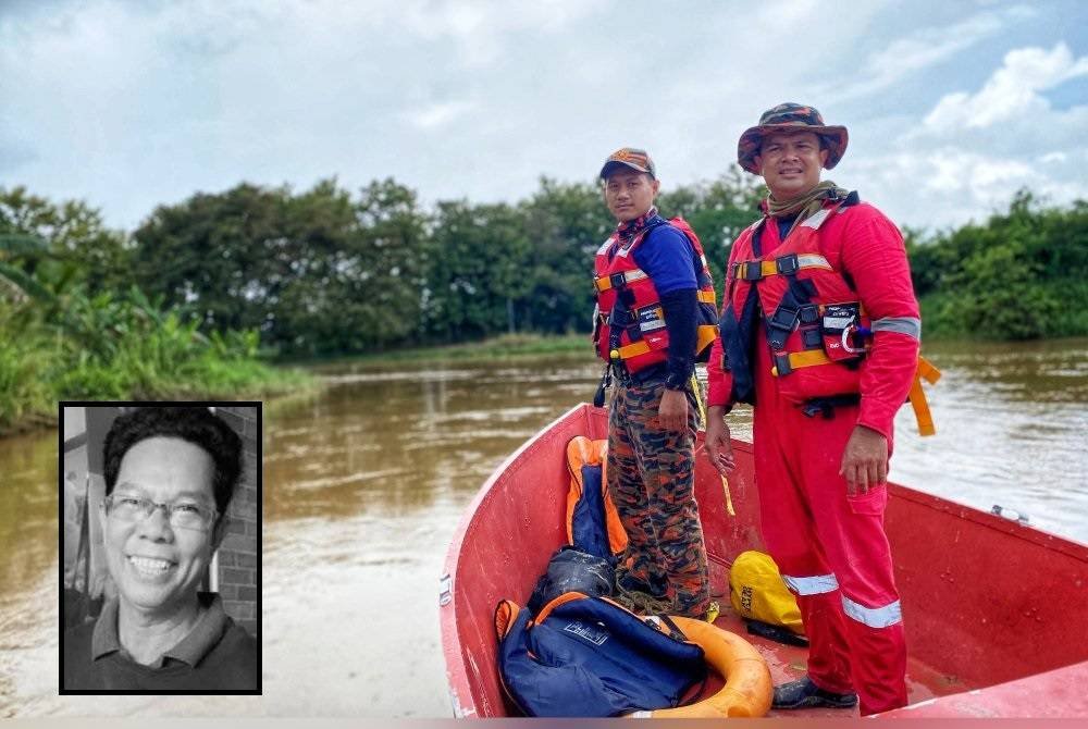 Anggota penyelamat sedang mencari jasad Sabari di sepanjang Sungai Padang Terap.