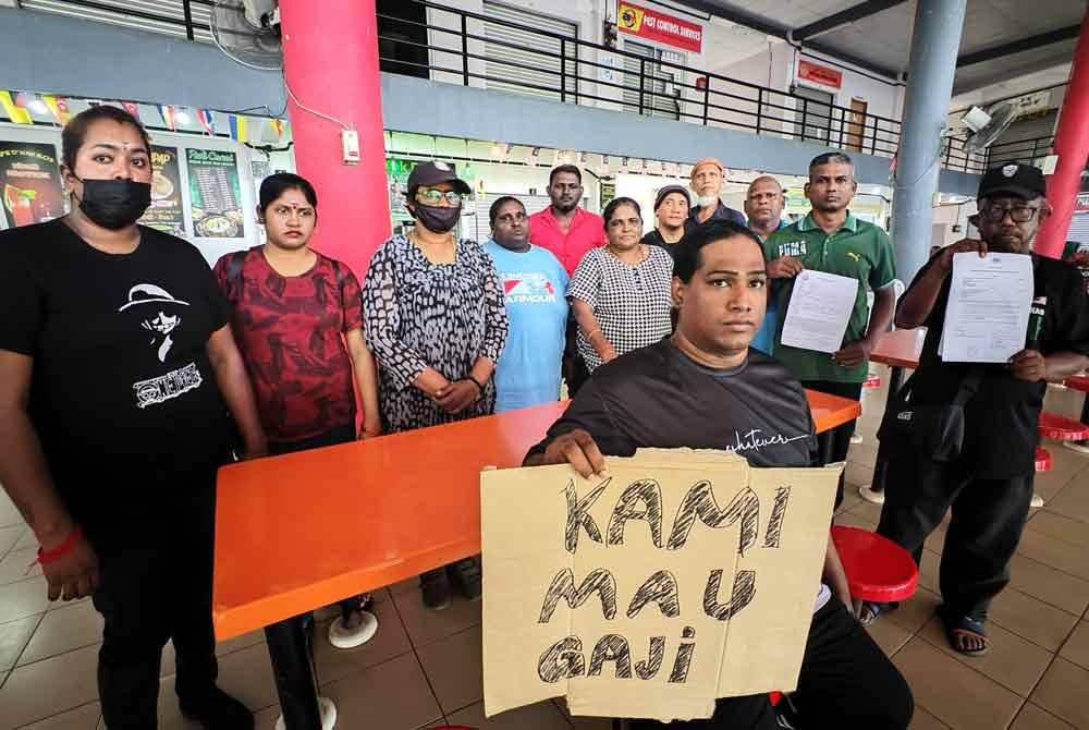 Pengawal keselamatan tuntut tunggakan gaji mereka.