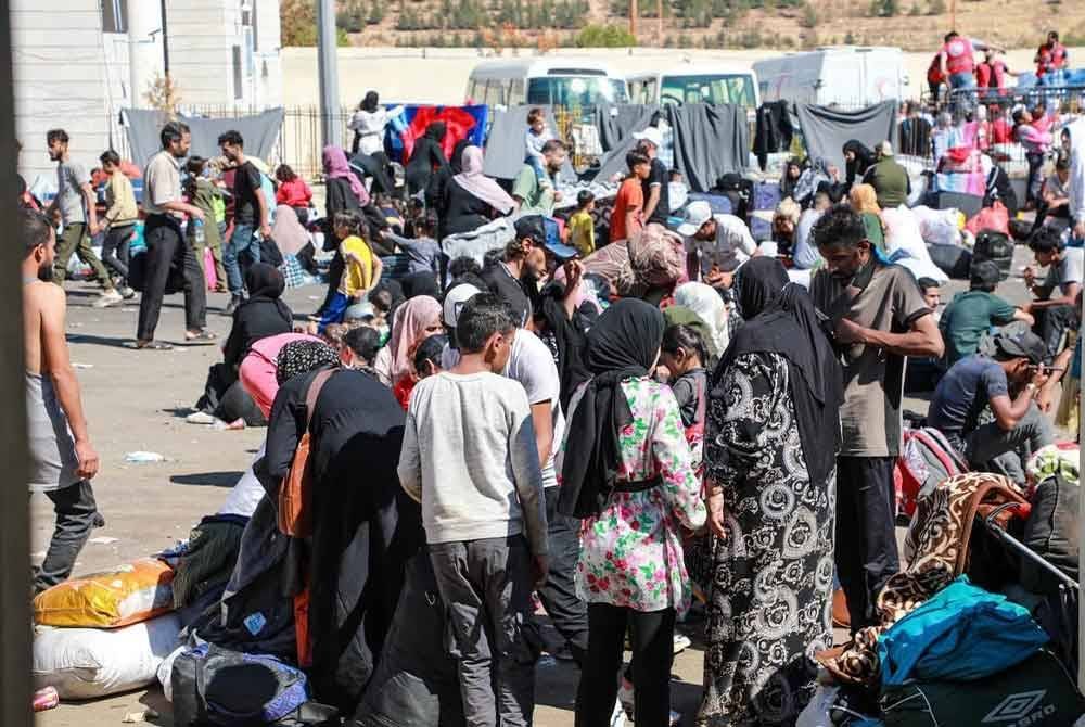 Warga Syria dan Lubnan tiba di Syria dari Lubnan sejak serangan Israel bermula pada 23 September lalu - Foto: UNHCR