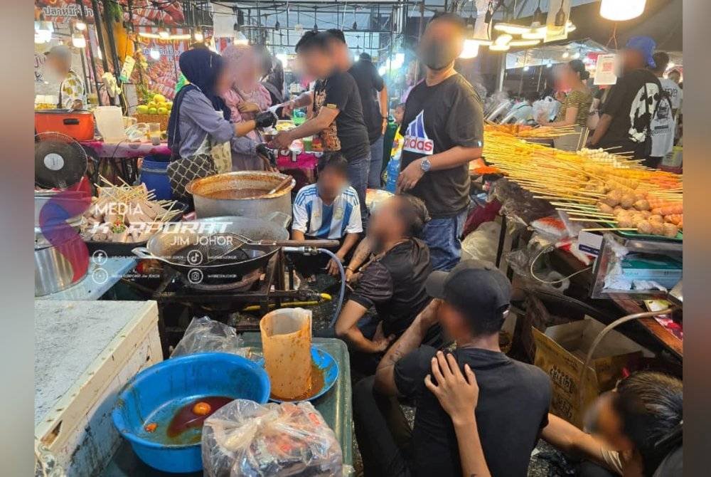 Beberapa warga asing yang ditahan dalam serbuan di festival makanan. Foto JIM Johor