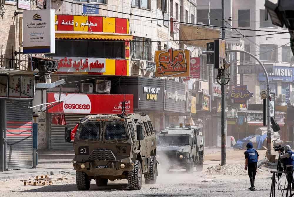 Hampir 50 ahli parlimen Britain mengalu-alukan resolusi PBB pada 18 September yang menyeru Israel agar segera menamatkan kehadirannya yang tidak sah di Wilayah Palestin yang Diduduki (OPT) dan mendesak kerajaan negara itu menghentikan semua eksport ketenteraan ke Israel. Foto AFP