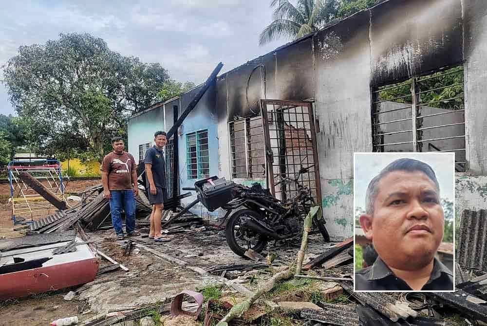 Khairul Anuar (kiri) berdiri di depan rumah sewa yang didiami sejak tujuh tahun lalu di Kampung Bukit Gedong musnah dalam kebakaran pada Khamis. Gambar kecil: Rais