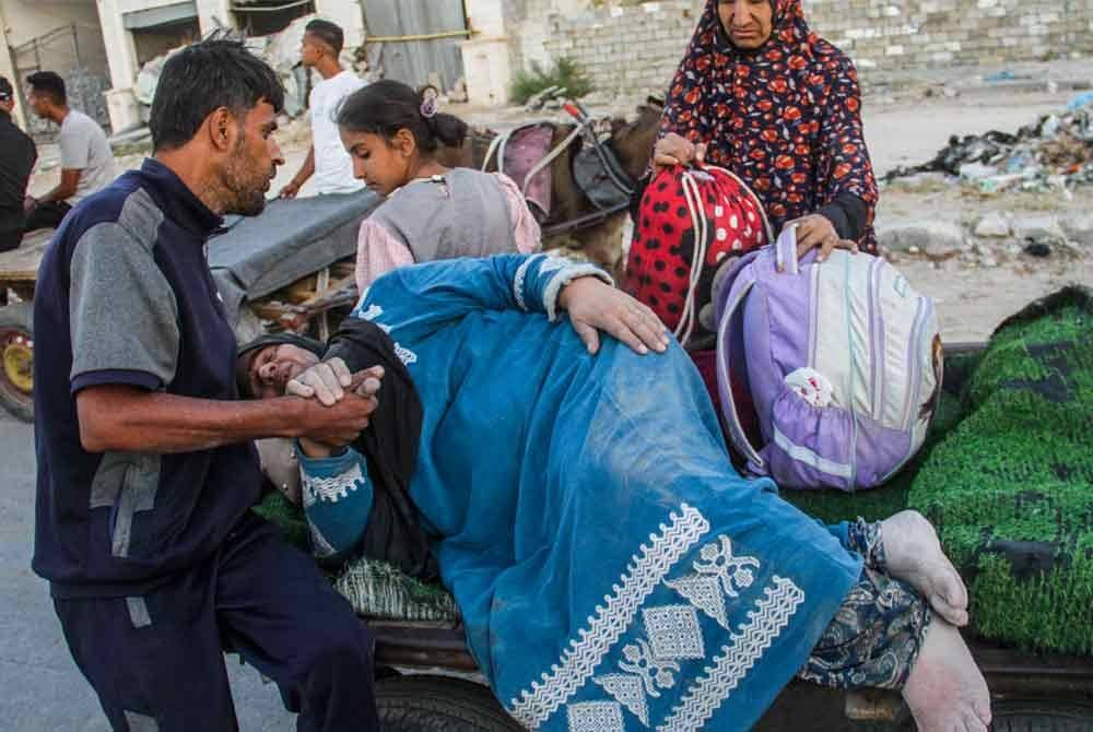 Sekurang-kurangnya 73 rakyat Palestin terbunuh pada Sabtu oleh pengeboman Israel di bandar Beit Lahia di utara Semenanjung Gaza. Foto Xinhua