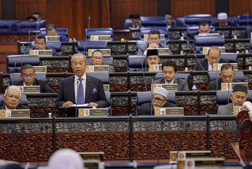 Pengerusi Perikatan Nasional (PN) Tan Sri Muhyiddin Yassin pada Persidangan Dewan Rakyat sempena Mesyuarat Ketiga Penggal Ketiga Parlimen ke-15 di Bangunan Parlimen pada Rabu. Foto Bernama