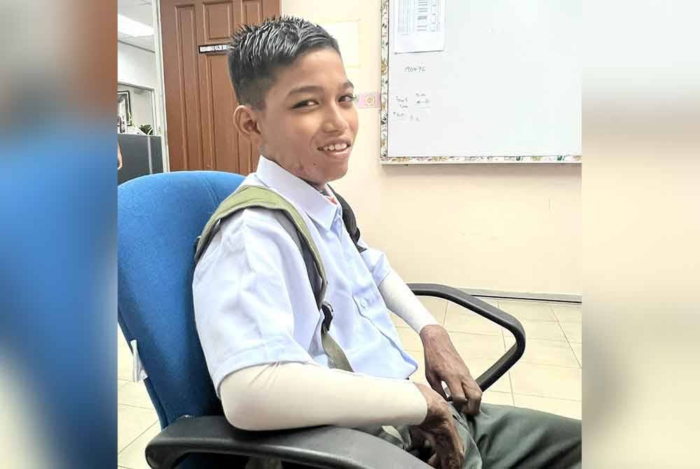 Mohd Darwisy tetap bersemangat untuk ke sekolah walaupun keadaannya masih lemah dan tidak seaktif dahulu.