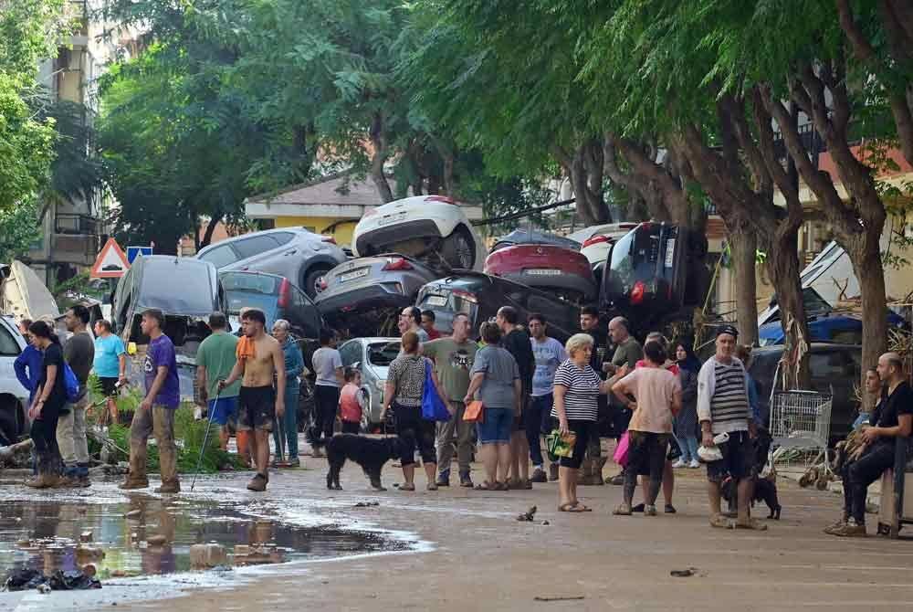 Angka kematian akibat banjir kilat di wilayah selatan dan timur Sepanyol meningkat sedikit kepada 207 orang. Foto AFP