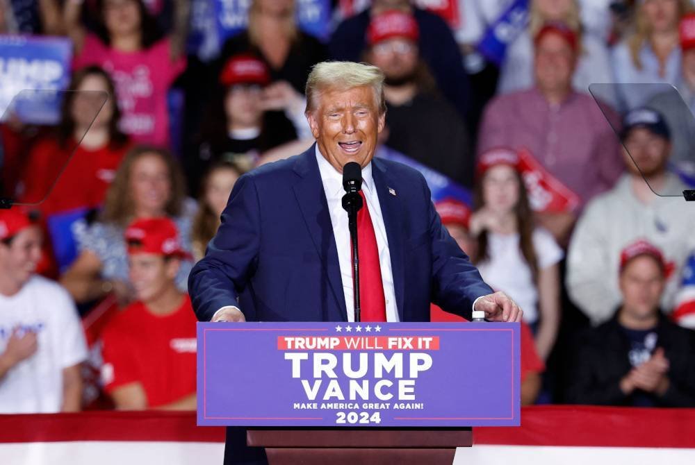 Trump berucap pada perhimpunan kempen terakhirnya di Van Andel Arena di Grand Rapids, Michigan. Foto AFP