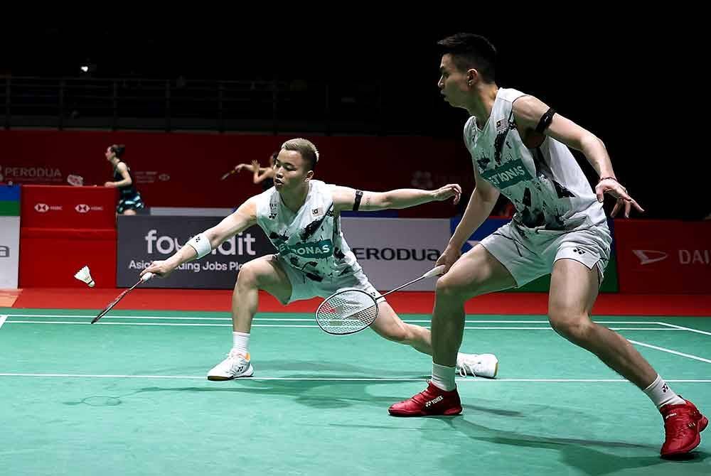 Wooi Yik (kanan)-Aaron meneruskan momentum positif di Korea Masters.