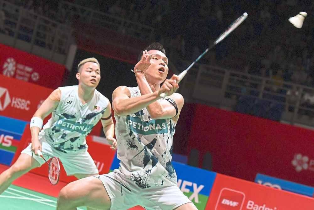 Aaron (kiri) dan Wooi Yik akan menentang pasangan tuan rumah dalam aksi final Korea Masters di Jeolla pada Ahad. Foto Agensi