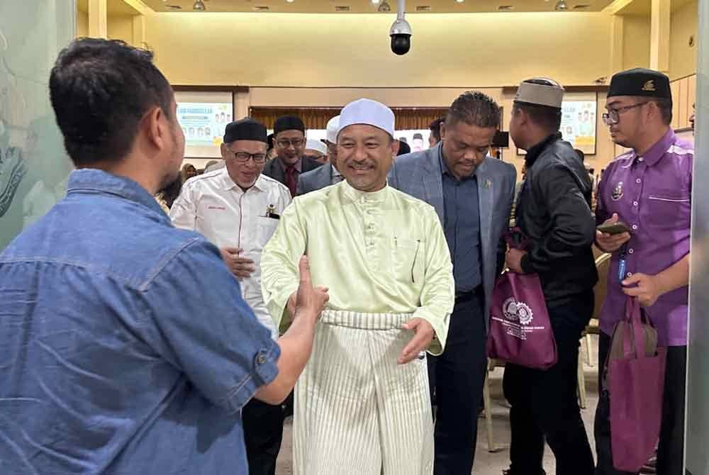 Mohd Nassuruddin (tengah) ketika menghadiri Majlis Sambutan Hari Hududullah di Kota Bharu.