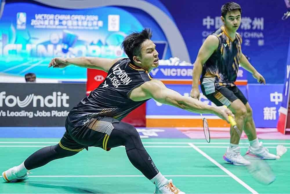 Nur Izzuddin (kiri) dan Sze Fei akan menentang satu lagi pasangan negara dalam saingan pusingan kedua Masters Jepun di Kumamoto pada Khamis. Foto Agensi.