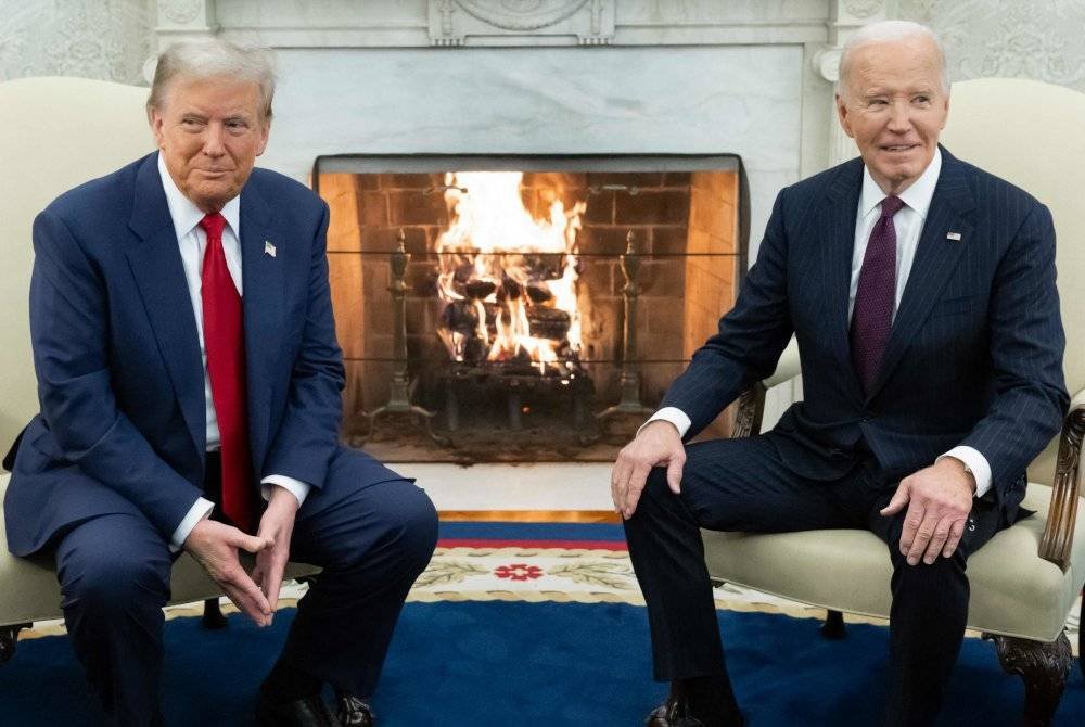 Biden dan Trump bertemu di Rumah Putih pada Rabu untuk berbincang mengenai proses peralihan kuasa. Foto AFP