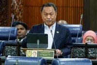 Mohammad Yusof Apdal ketika sesi Waktu Pertanyaan Menteri sempena sidang Dewan Rakyat hari ini. - Foto: Bernama