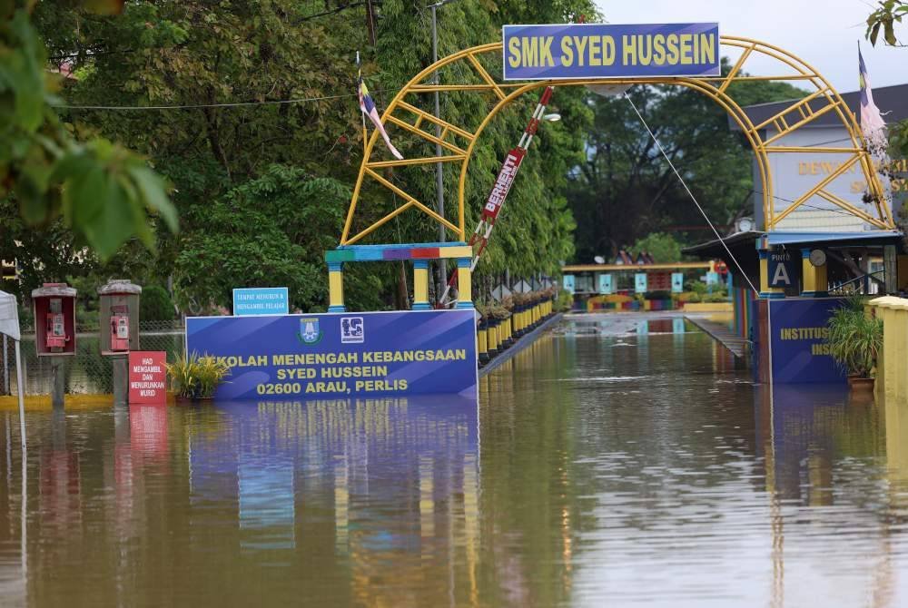 Sebanyak lapan sekolah di Perlis akan ditutup esok berikutan terkesan banjir dengan kesemua pelajar sekolah itu belajar secara Pengajaran dan Pembelajaran di Rumah (PdPR) sehingga keadaan kembali pulih seperti sedia kala. Foto Bernama