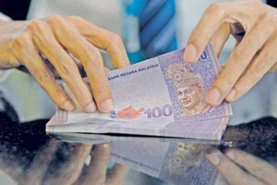 Ringgit ditutup hampir tidak berubah berbanding dolar AS pada Khamis. Gambar hiasan