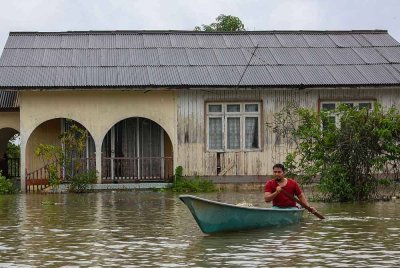 Keadaan terkini Kampung Meranti, Pasir Mas yang ditenggelami banjir hari ini, berikutan hujan berterusan sejak beberapa hari lepas. Foto Bernama