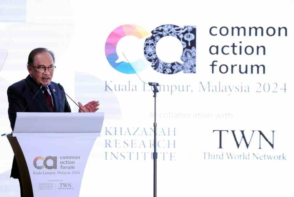 Anwar menyampaikan ucaptama majlis Common Action Forum 2024 Malaysia di sini, pada Isnin. Foto Bernama