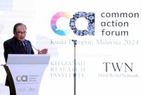 Anwar menyampaikan ucaptama majlis Common Action Forum 2024 Malaysia di sini, pada Isnin. Foto Bernama