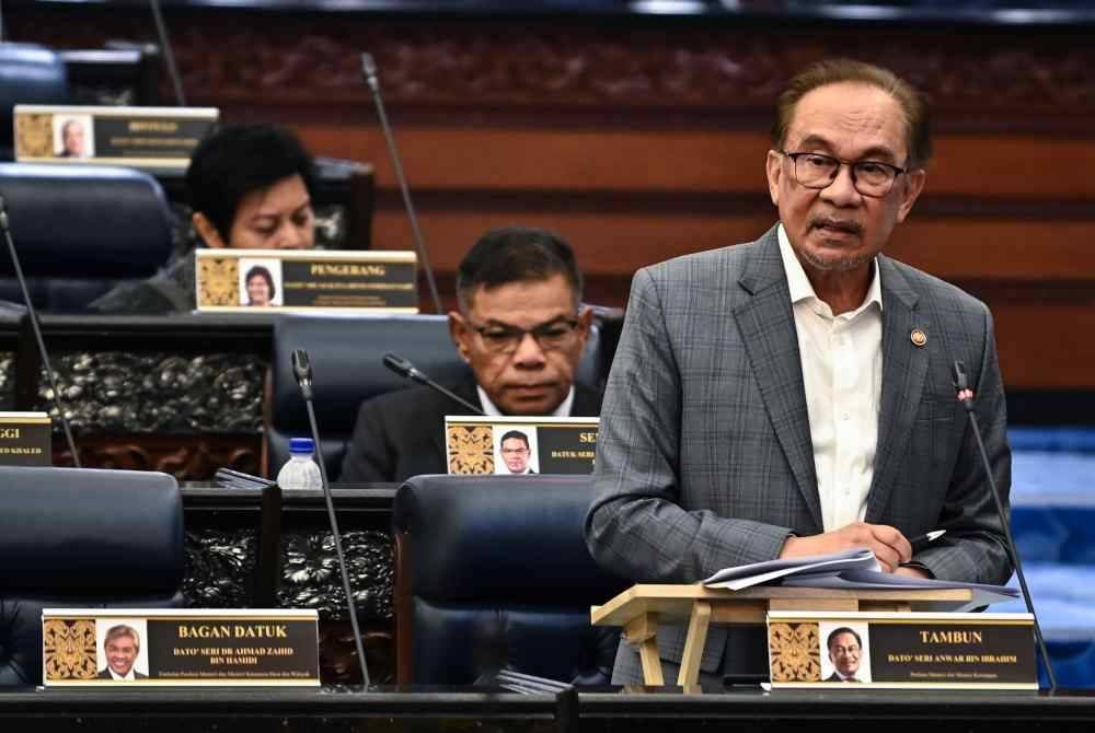 Anwar bercakap di Dewan Rakyat pada Selasa. Foto Jabatan Penerangan