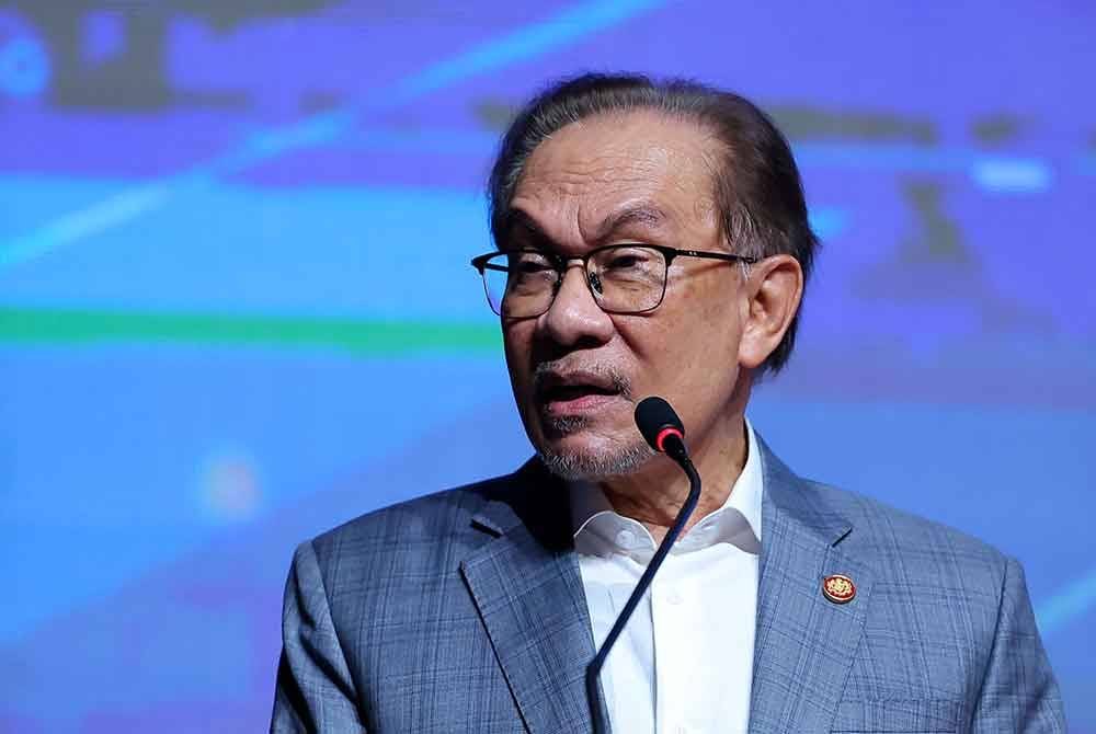 Anwar ketika berucap pada Majlis Perasmian IPFC di Dewan Merdeka, Pusat Dagangan Dunia Kuala Lumpur (WTC) hari ini. - Foto: Bernama