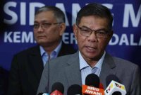 Menteri Dalam Negeri Datuk Seri Saifuddin Nasution Ismail (kanan) ketika sidang media pada Perhimpunan Bulanan Kementerian Dalam Negeri (KDN) bulan November 2024 di Kompleks Setia Perkasa hari ini.