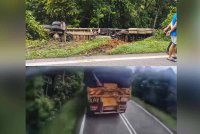 Keadaan lori selepas terbabas dan terjatuh ke tepi cerun bahu jalan di Jalan Bukit Damar-Lakum, Temerloh pada Selasa.