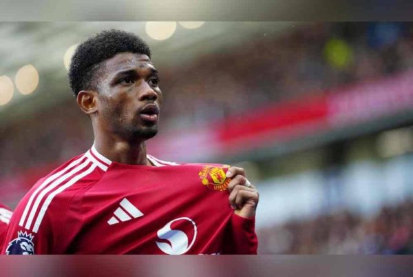 Diallo jelmakan tiga mata buat Manchester United di Stadium Etihad. Foto Agensi