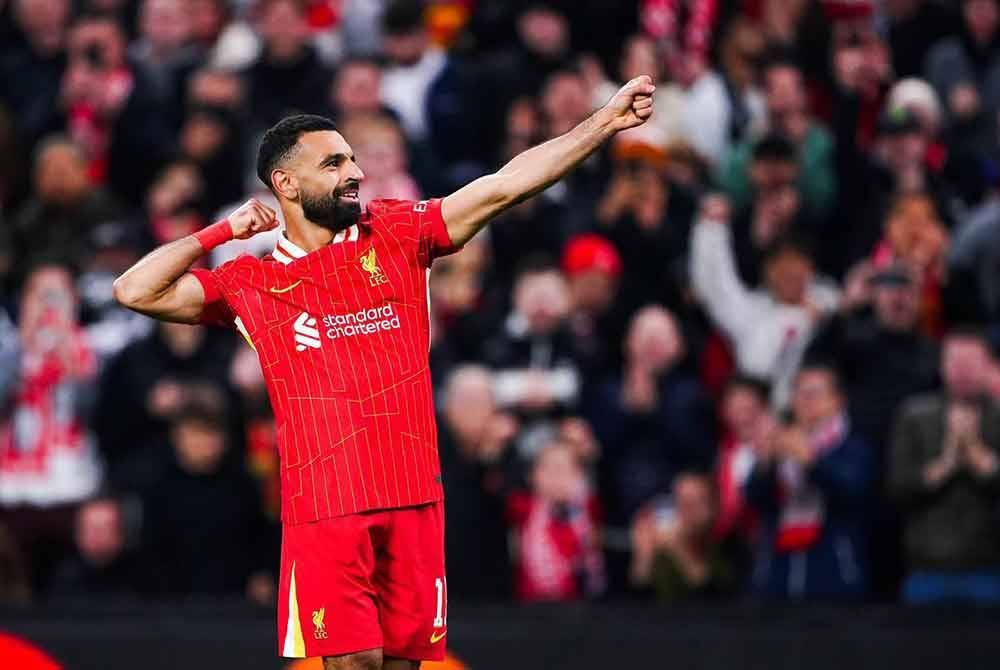 Mohamed Salah menyumbangkan dua gol buat Liverpool di Stadium Tottenham Hotspur. Foto: Agensi