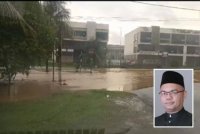 Keadaan banjir kilat yang didakwa berlaku di persimpangan jalan di Kampung Tradisi Sungai Choh baru-baru ini. (Gambar kecil: Muhammad Muhaimin Harith)