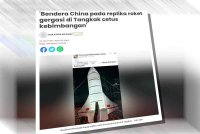 Laporan Sinar Harian mengenai bendera China pada sayap replika roket di sebuah karnival di Tangkak.