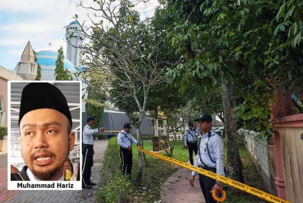 Anggota polis memasang pita keselamatan di sekitar Masjid Al-Muktafi Billah Shah hari ini bagi memastikan kelancaran proses hukuman sebat mengikut hukum syariah dikhalayak ramai. Foto Bernama