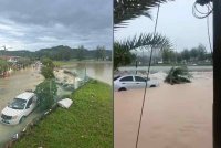 Tangkap layar sebuah video tular memaparkan kejadian banjir di Taman Seri Alam, Puncak Alam, Selangor selepas benteng takungan air pecah pada Ahad.