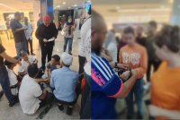 Pegawai operasi melakukan pemeriksaan dokumen terhadap warga asing yang ditahan pada Op Serkap di sebuah pusat beli-belah di Ampang, pada Jumaat.