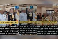 Tangkap layar video memaparkan beberapa individu sebuah pertubuhan berpakaian rasmi menyerupai pakaian istiadat pasukan keselamatan negara di sebuah majlis.