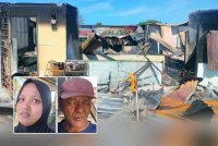 Keadaan kebakaran di Tanjung Dawai menyebabkan 14 buah rumah terbakar. Gambar kecil dari kiri: Fitrah dan Azme 