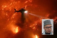 Helikopter pemadam kebakaran menjatuhkan air ketika api di Palisades merebak ke kawasan kejiranan Mandeville Canyon dan Encino, California pada Sabtu - Foto AFP, gambar kecil: Mohd Asri