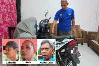 Amir menunjukkan motosikal terpaksa disimpan dalam rumah kerana bimbang kejadian sama berulang.