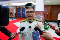 Fahmi ketika ditemui pemberita pada istiadat pembukaan Mesyuarat Pertama Penggal Keempat Parlimen ke-15 di Bangunan Parlimen pada Isnin. Foto Bernama