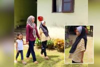 Nor Ariana (kanan) tidak pernah segan untuk keluar di hadapan orang ramai, malah jika diminta berkerusi roda dia enggan dan memilih untuk berjalan walaupun cepat penat.